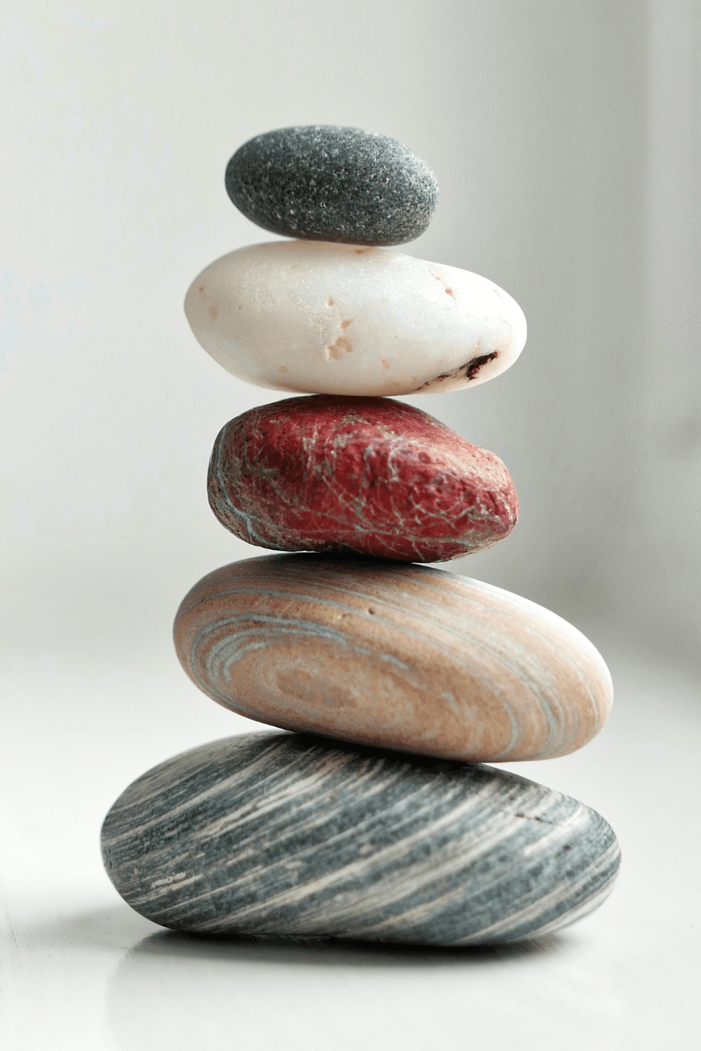 Coloured stones balanced on top of one another