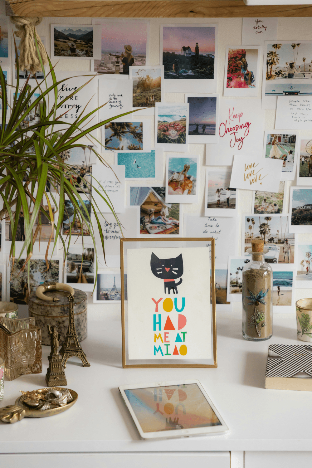 Example of a vision board with images and positive quotes