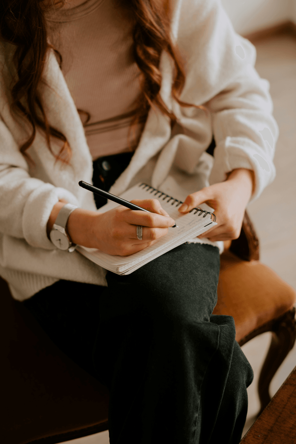 Female therapist taking notes