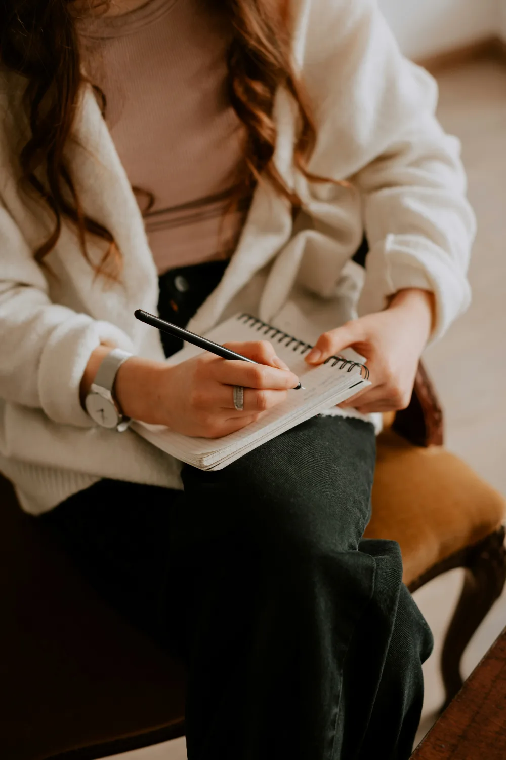 Female therapist taking notes