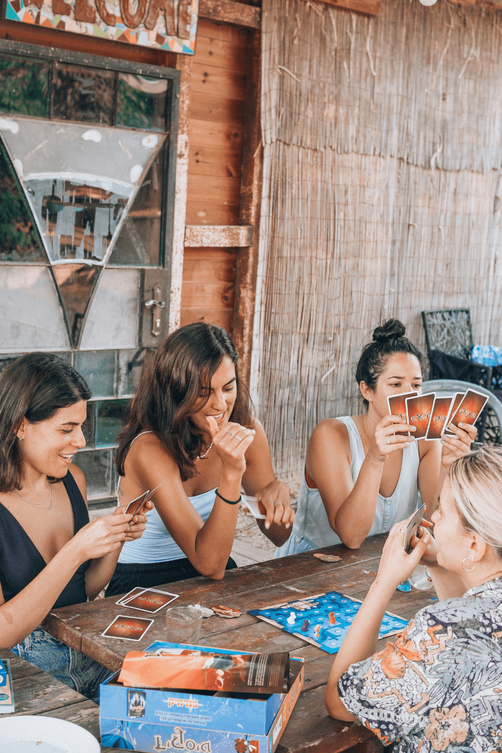 Group of women playing a card game