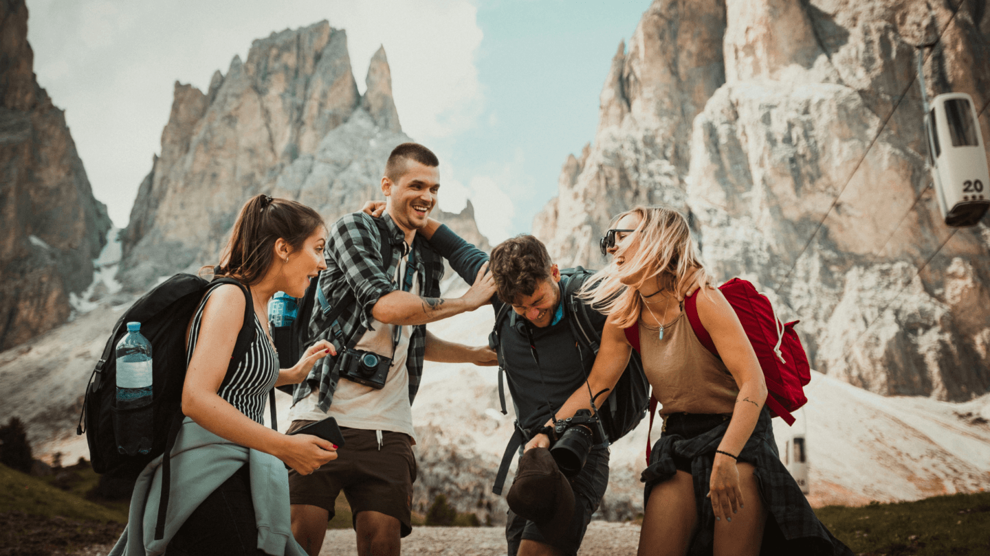 Group playing together near mountains