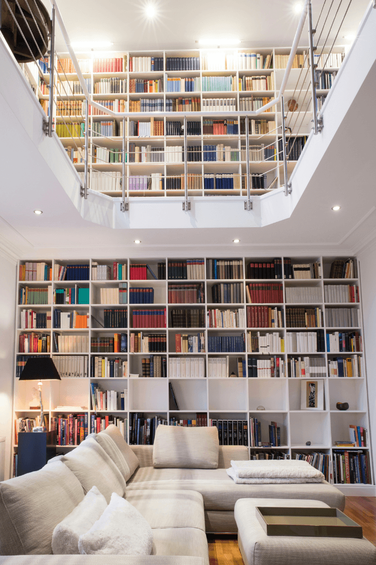 White bookshelves filled with books