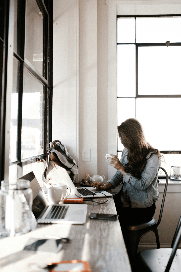 Woman busy working on laptop