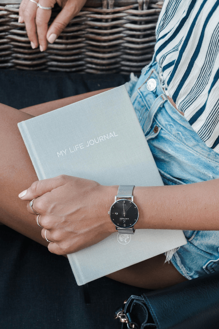 Woman holding a life journal