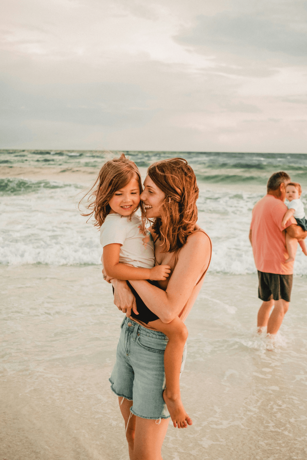Young family on the beach
