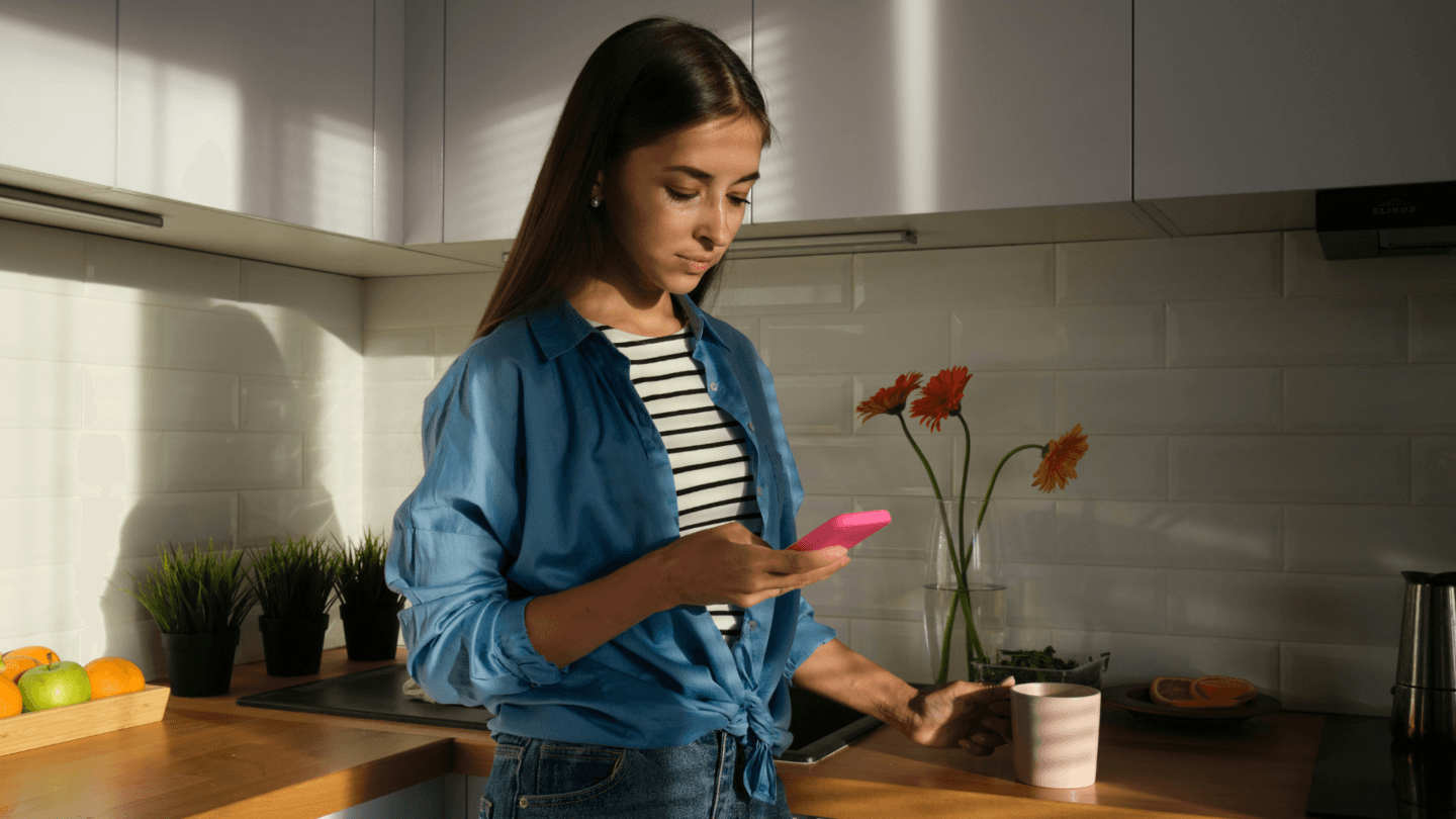 Young woman looking at mobile phone