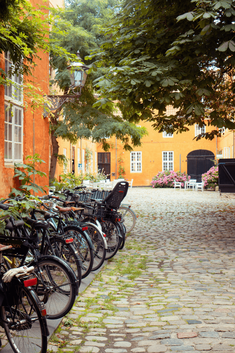 Bikes on cobbled street in Copenhagen Denmark