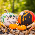 Decorated Halloween pumpkins one white one orange