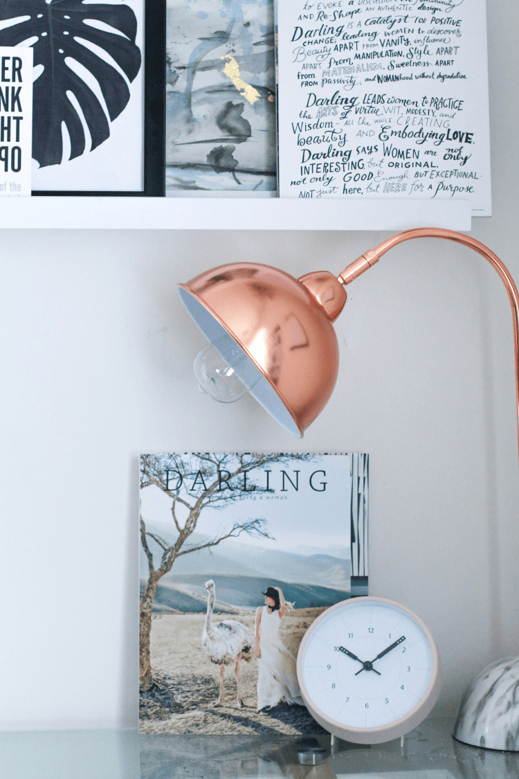Desk with rose gold lamp