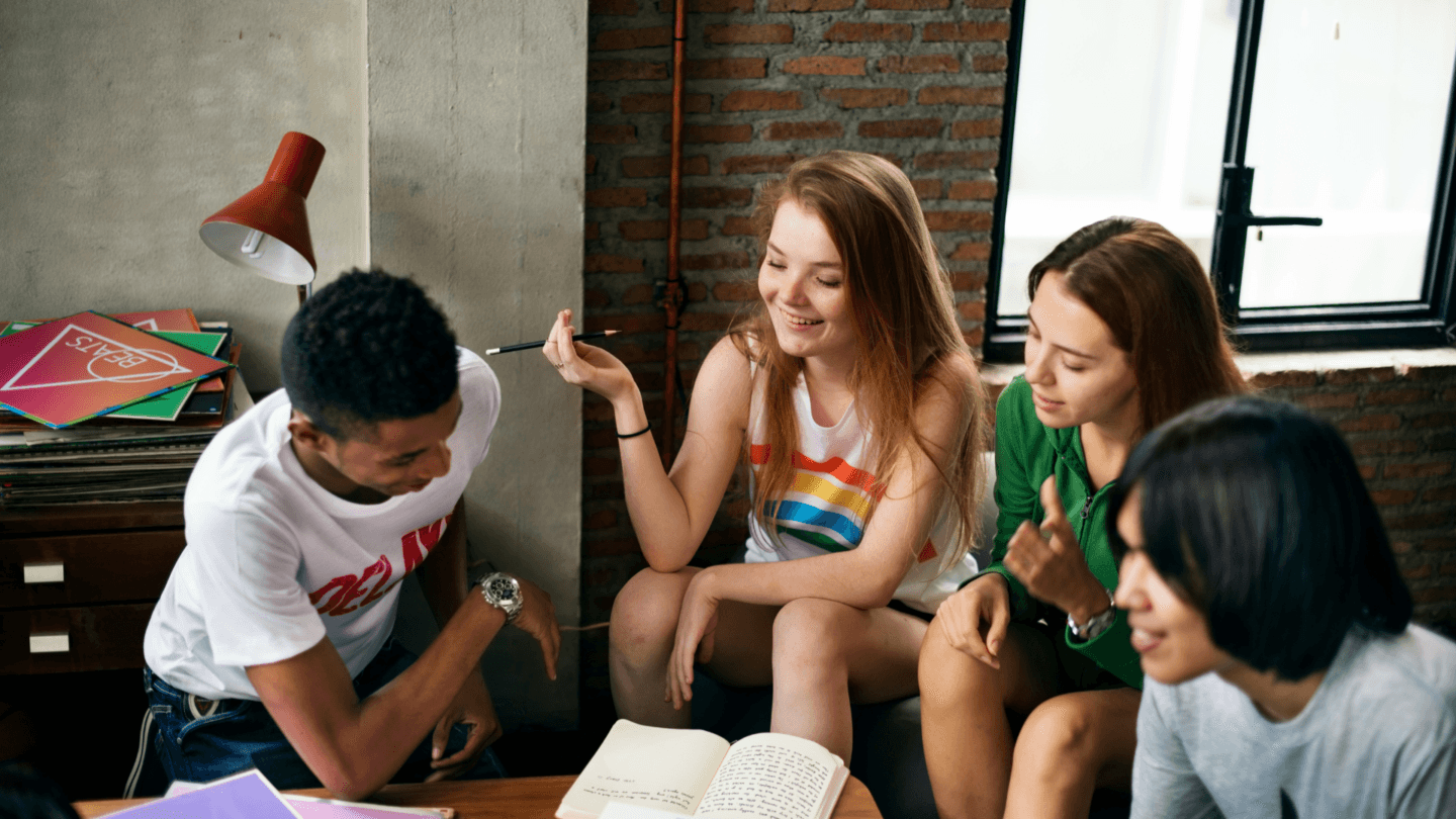 Group of teenagers talking together