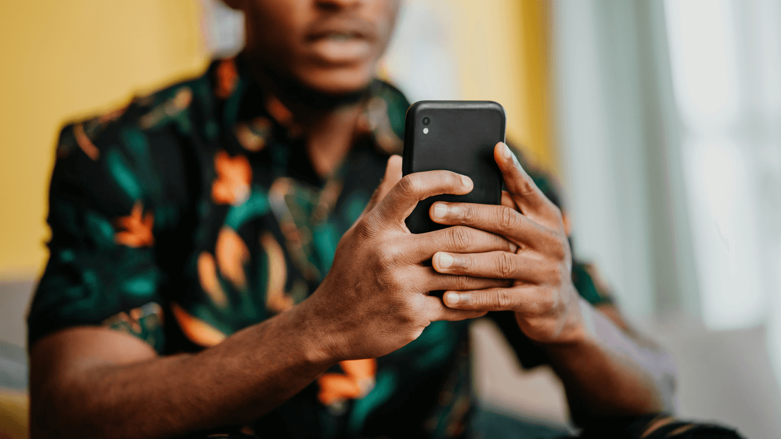 Man looking at smartphone