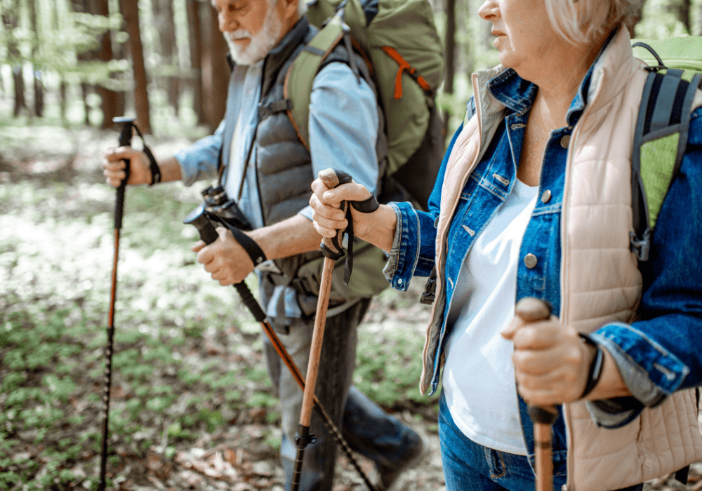 Older couple walking in the woods