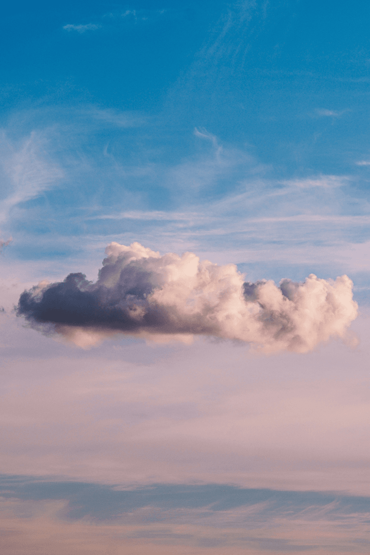 Single cloud against backdrop of blue sky