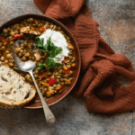 bowl of lentil soup and slice of wholemeal bread
