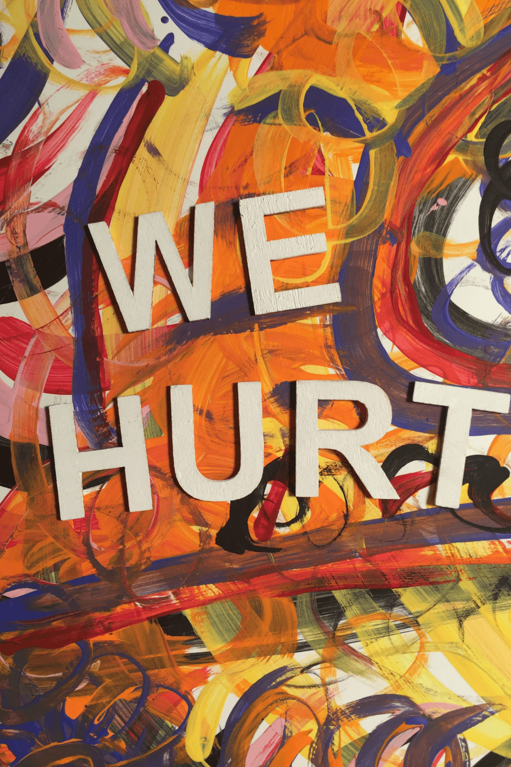 piece of artwork saying we hurt