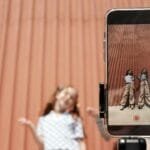 Two young girls creating TikTok dances