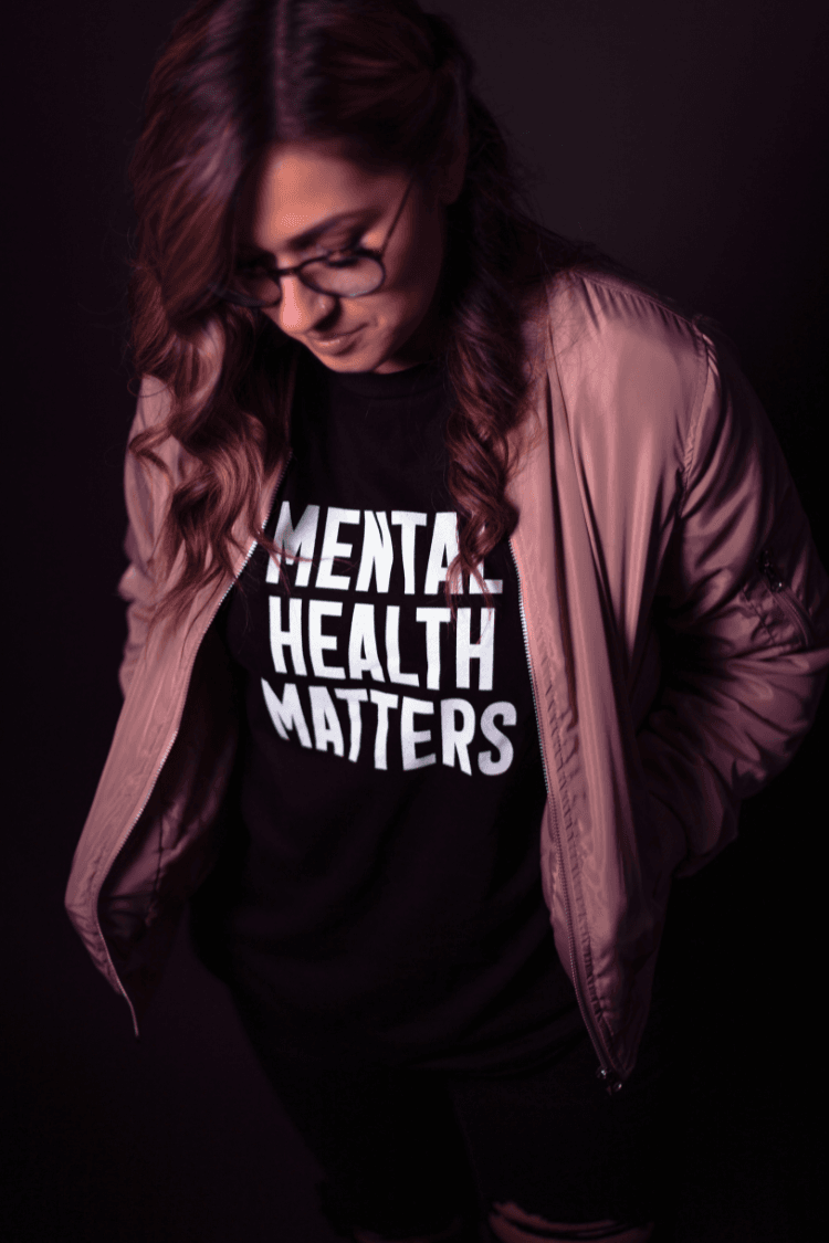 Woman wearing black mental health matters tshirt