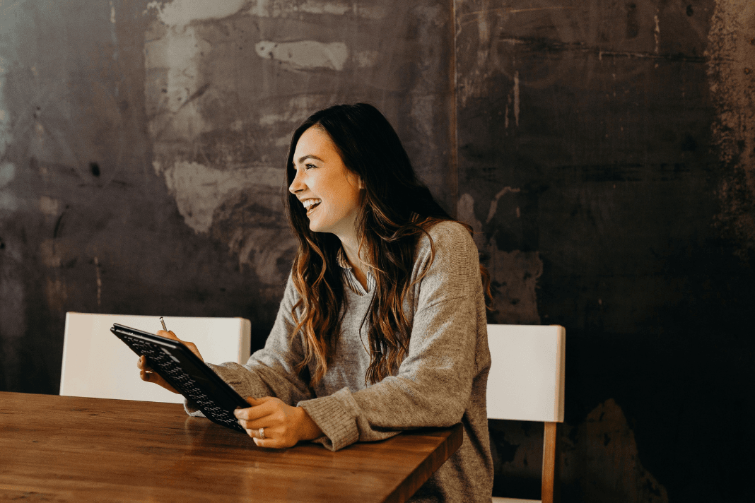 Young woman smiling in office