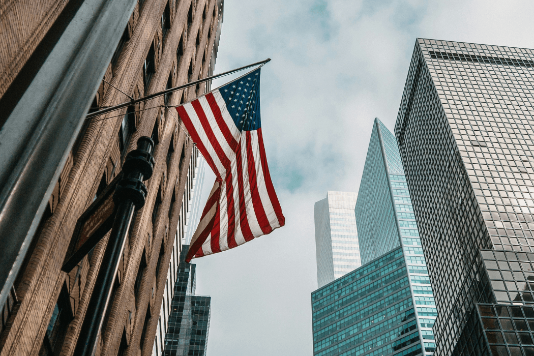 US flag on building shot from below