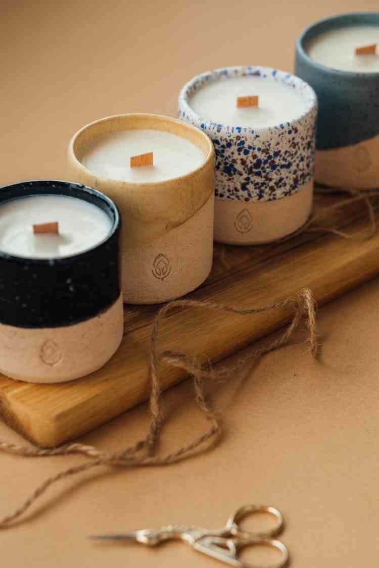Line of four scented candles with wood wick