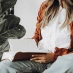Woman holding journal